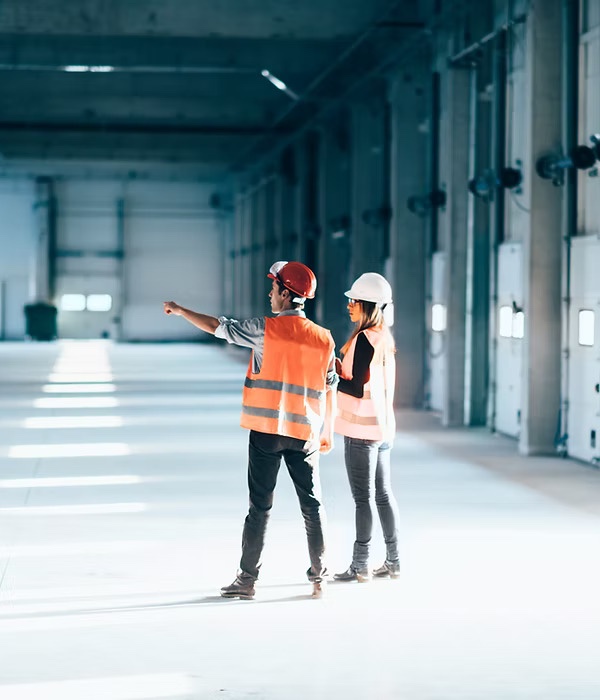 NSS Homes LTD construction team working on drywall installation project